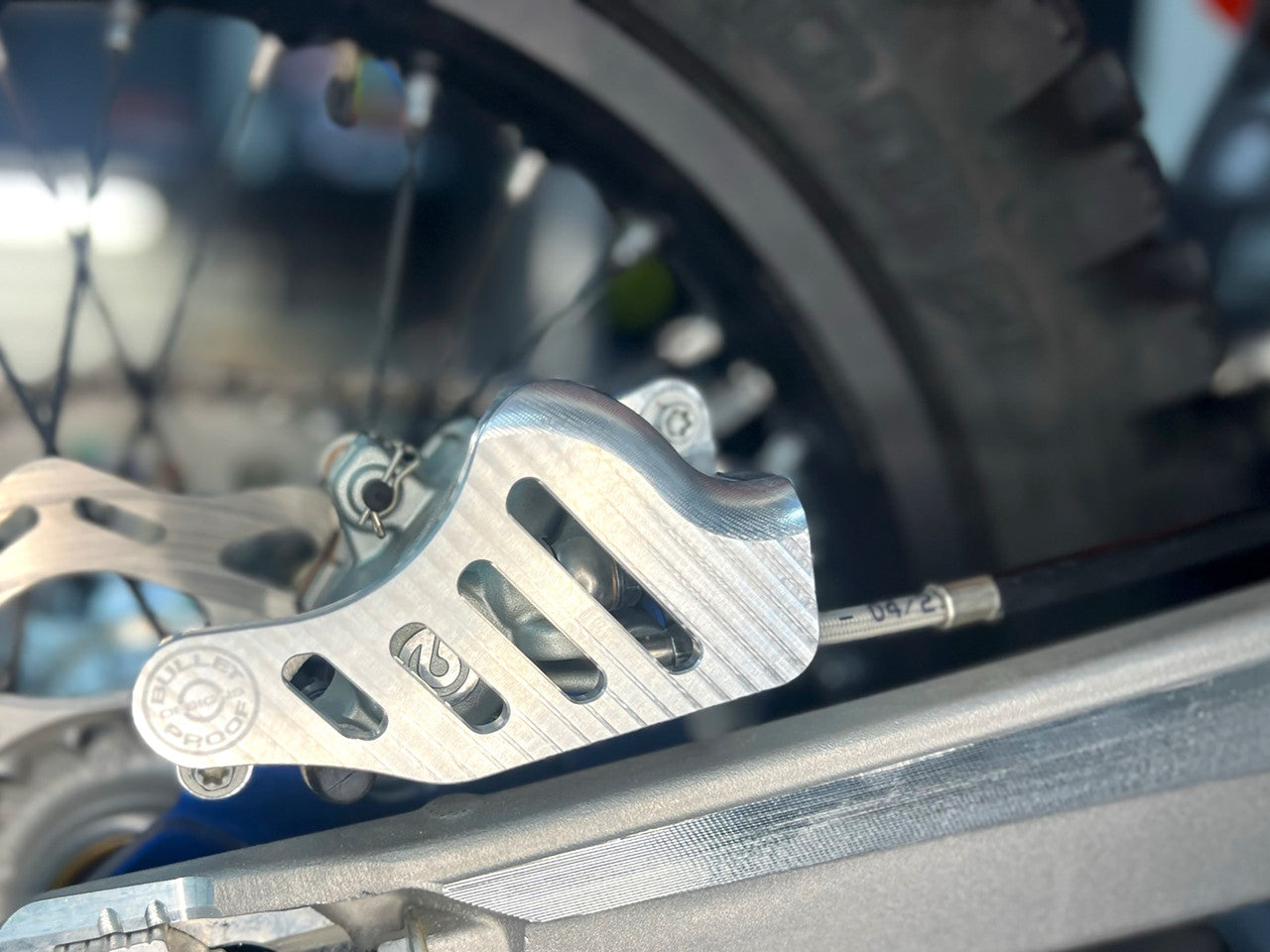 BRAKE CALIPER GUARD