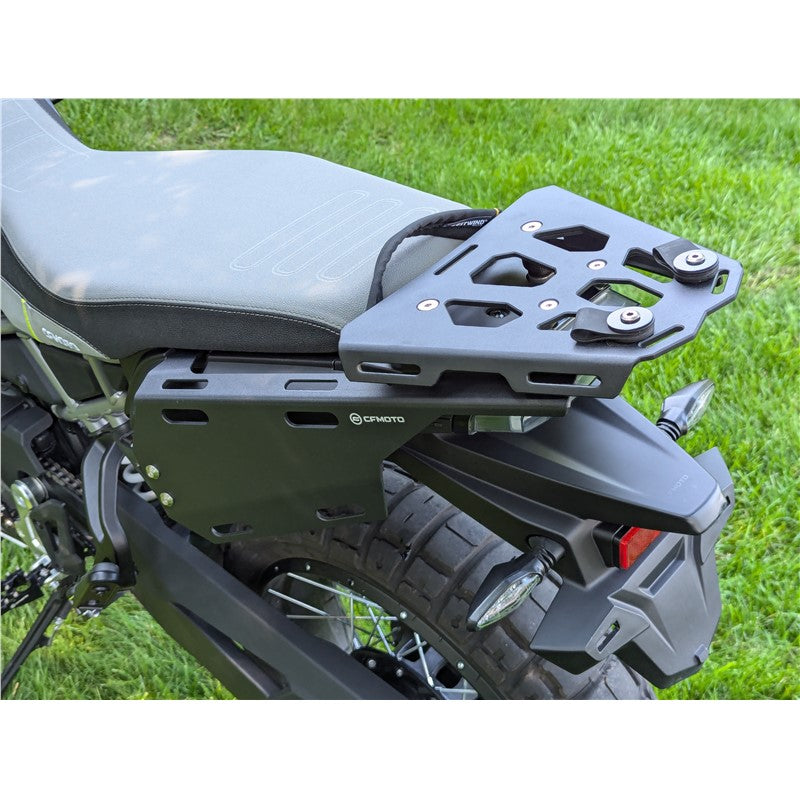 Motorcycle luggage rack on a grassy background