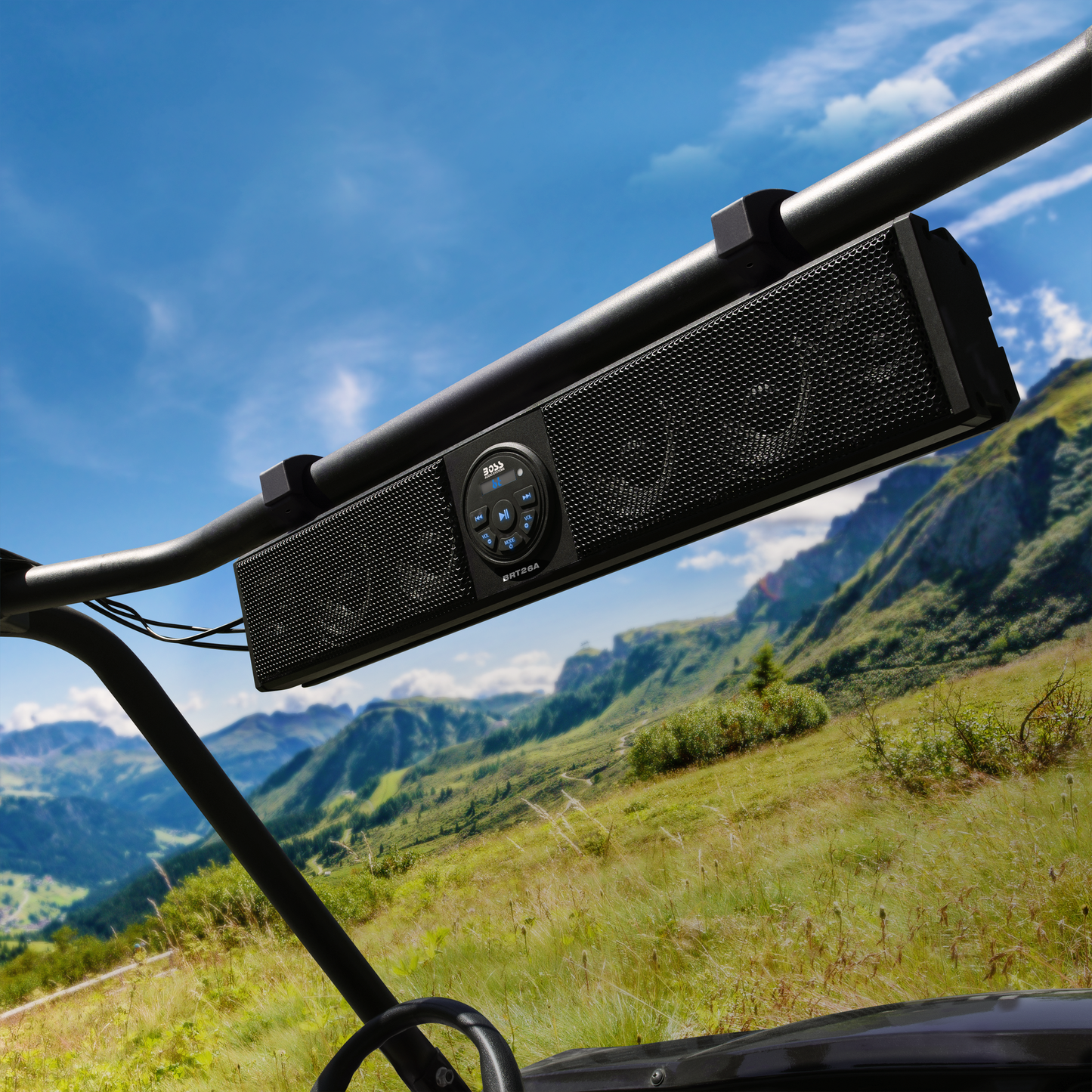 Boss Audio System with mountainous landscape in the background