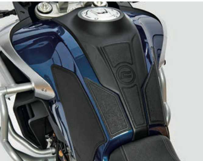 Close-up of a motorcycle seat with a brand logo on a white background