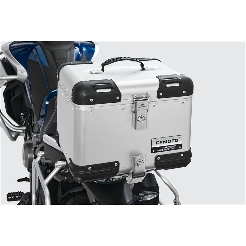 Motorcycle with a white and black storage box on a gray background