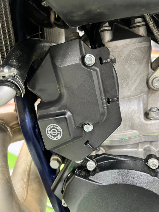 Bullet Proof Designs billet aluminum power valve cover protects 2-stroke KTM, Husqvarna, and GasGas engines from debris and impactt