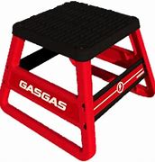A red and black plastic bike stand with 'EDRIVE' and 'GASGAS' branding on it.