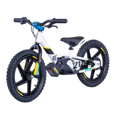 Husqvarna Factory Replica STACYC 12eDRIVE electric balance bike for kids with non-powered and powered modes, medium speed setting, and beginner-friendly design for balance and outdoor fun