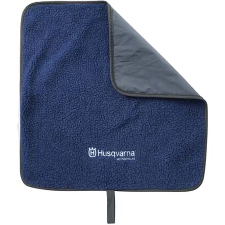 Navy blue HUSQVARNA paddock changing mat with a gray trim. The mat is laid flat and has a textured surface.