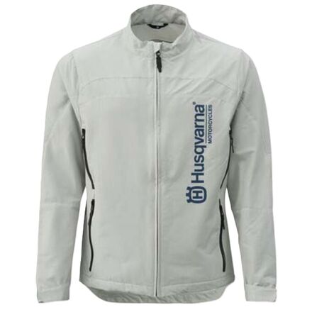 A gray off-road motorcycle jacket with fleece lining, featuring a YKK zip fastener, reinforced seams, and reflective surfaces. The jacket has multiple pockets and is designed for windproof and water repellent properties.