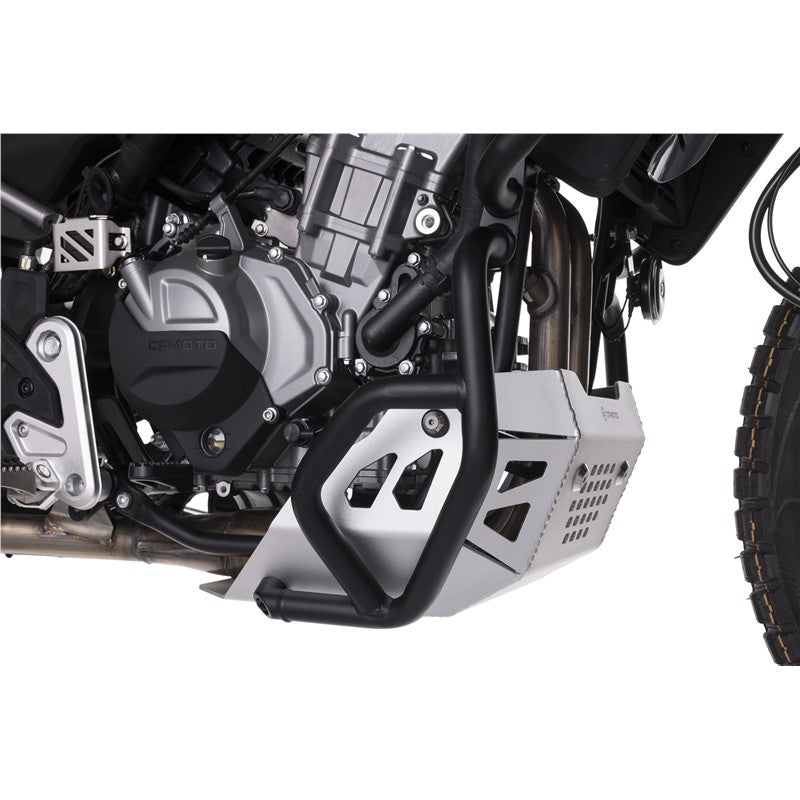 Motorcycle engine with protective guard on a white background
