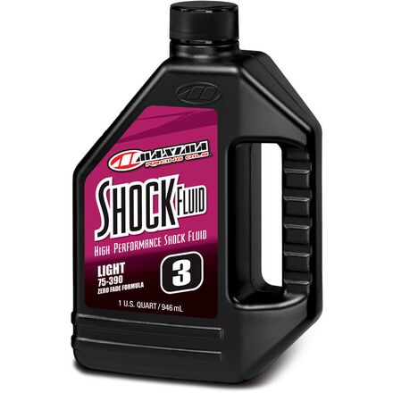 Maxima Shock Fluid bottle with black label on a white background