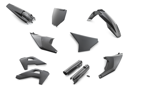 Set of motorcycle plastic parts on a white background