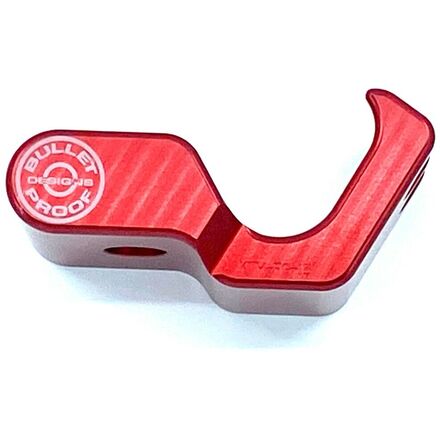 A red Bullet Proof Designs fork lug guard designed to fit on a motorcycle's front suspension system.
