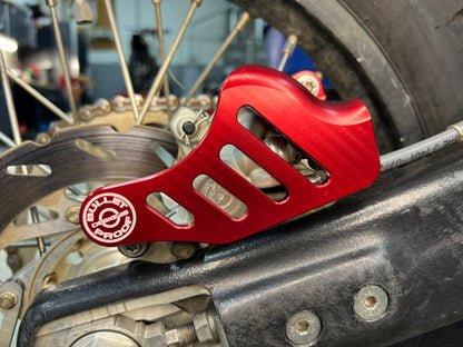 Bullet Proof Designs billet aluminum rear brake caliper guard for off-road motorcycles, fits BPD rear disc guards on KTM, Husqvarna, GasGas, Sherco, Yamaha, Honda, Beta, and Kawasaki bikes