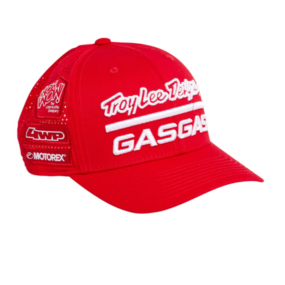 A red baseball cap with 'TLD GASGAS TEAM' text and logos on the front.