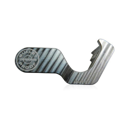 A Silver Bullet Proof Designs fork lug guard designed to fit on a motorcycle's front suspension system.