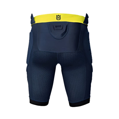 Navy protective shorts with yellow waistband on a light gray background