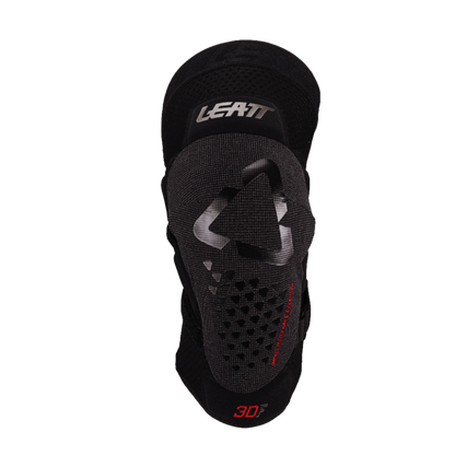Black knee pad with Leatt branding on a white background