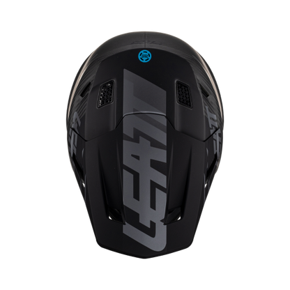 Black Leatt Moto 9.5 Carbon V23 Helmet Kit on a white background.