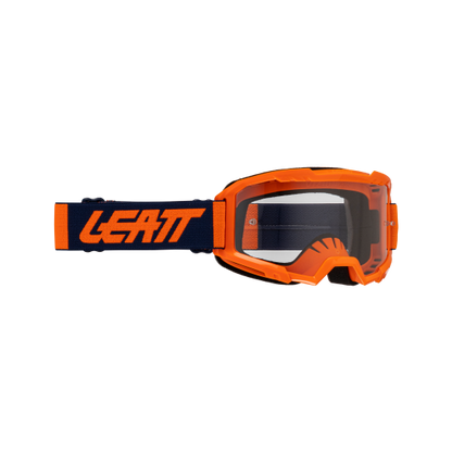 Orange goggles with clear lenses on a white background