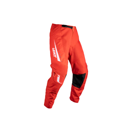 Red motocross pants with black patch on a white background